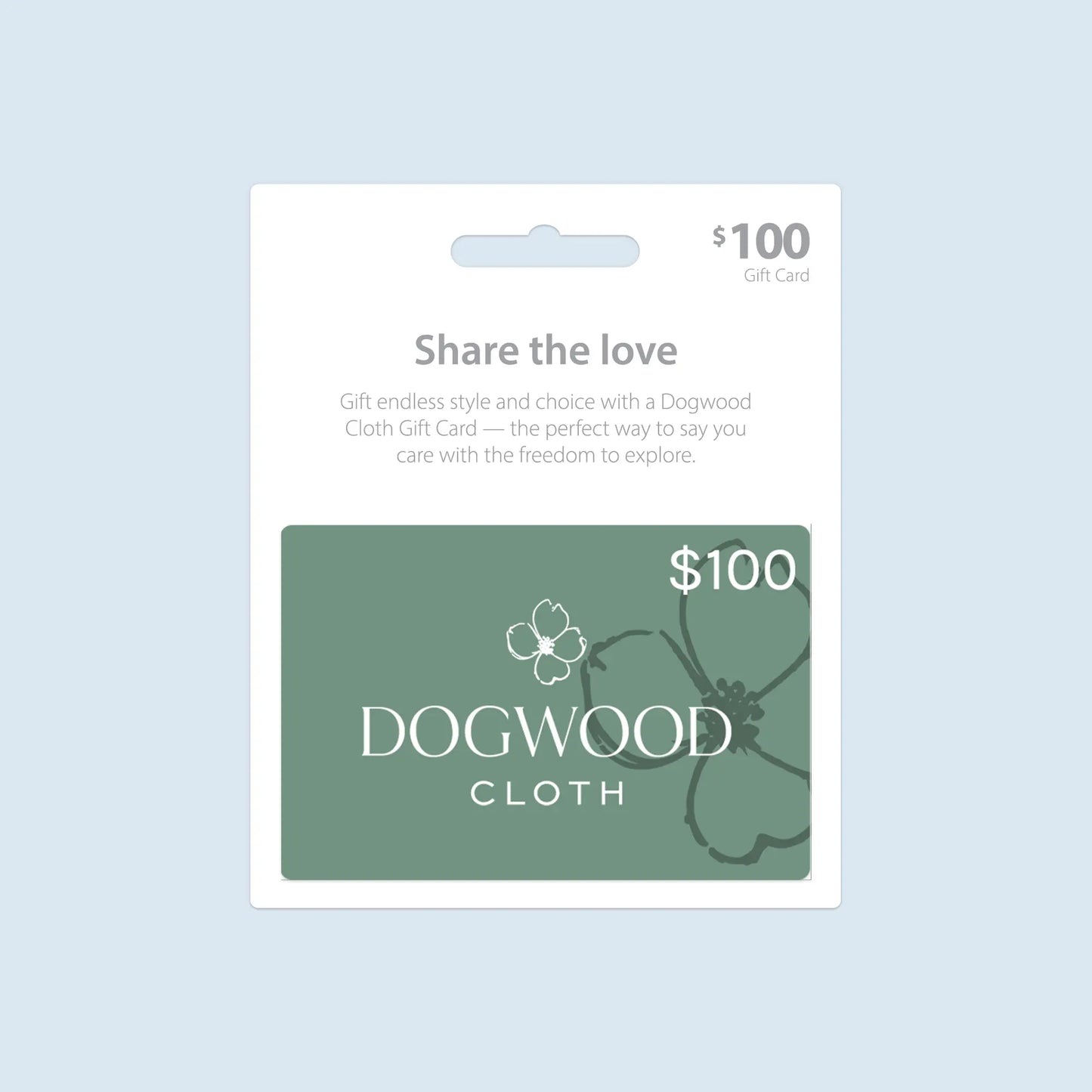 A $100 Dogwood Cloth Gift Card from Dogwood Cloth in green packaging. The text on the packaging reads "Share the love" with a note about gifting endless style and choice with trendsetting apparel from Dogwood Cloth Gift Cards.